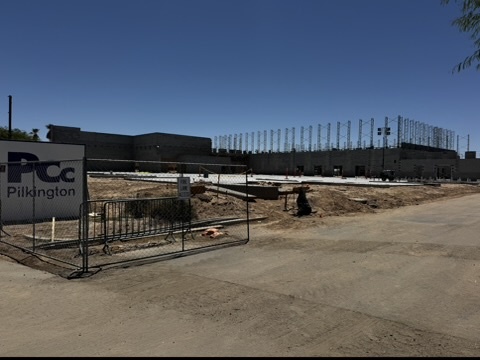 The Cocopah Event Center under construction, with block walls and roof trusses in progress