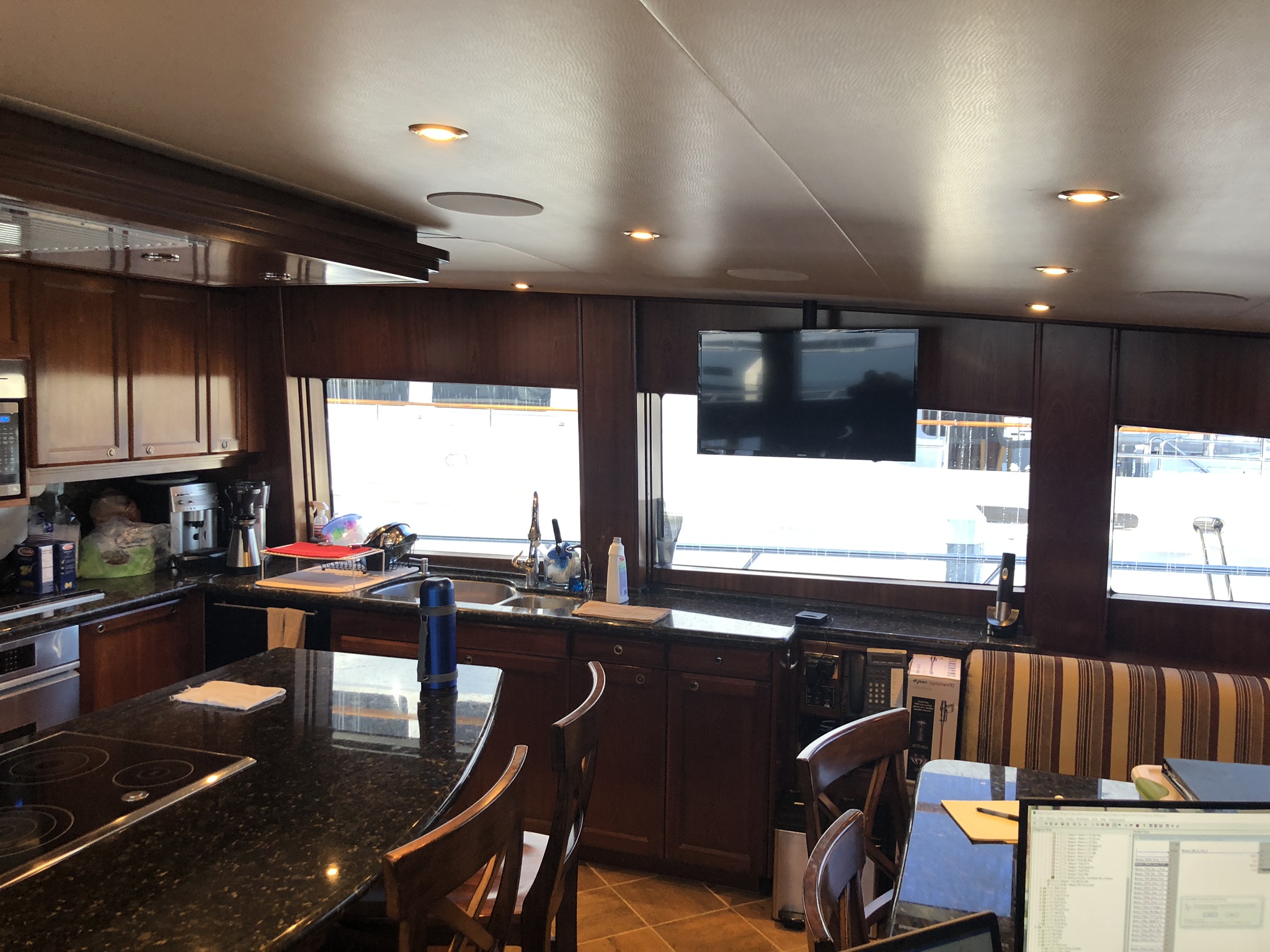 Integrated TV and ceiling audio in M/Y Valkyrie galley